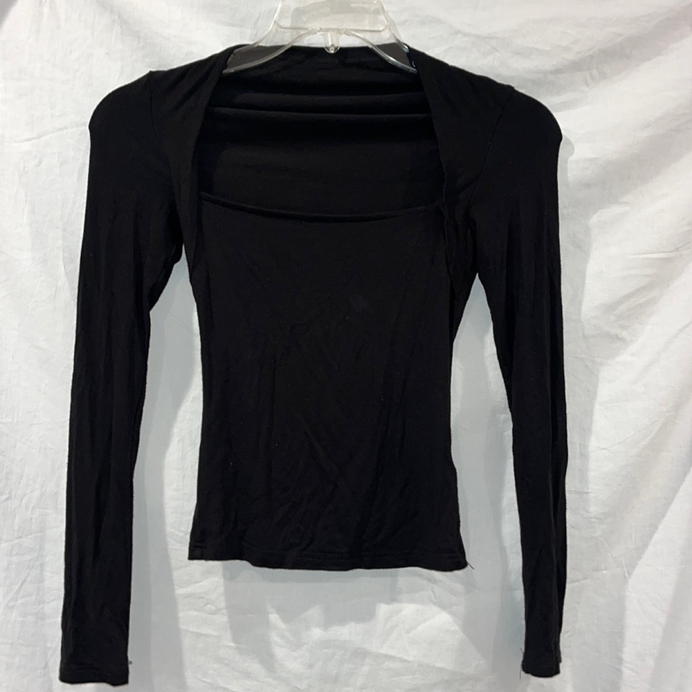 square neck formfitting, black top.